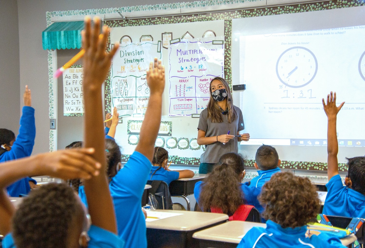 Here we see one of our IDEA math teachers getting students excited about learning about how time works.