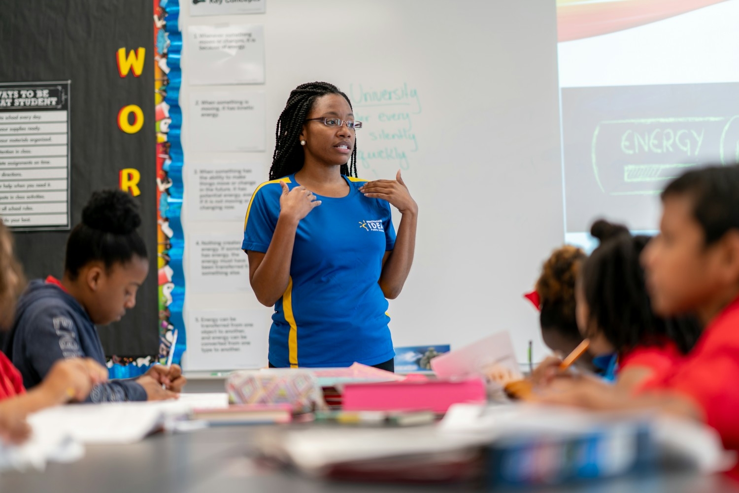 Here we see one of our IDEA teachers explaining how energy works!