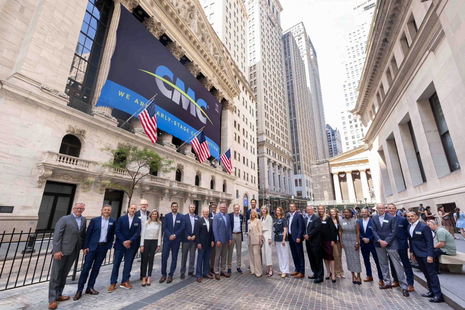 CMC leaders stand outside the New York Stock Exchange, where CMC rang the Closing Bell at their 2026 Investor Day.