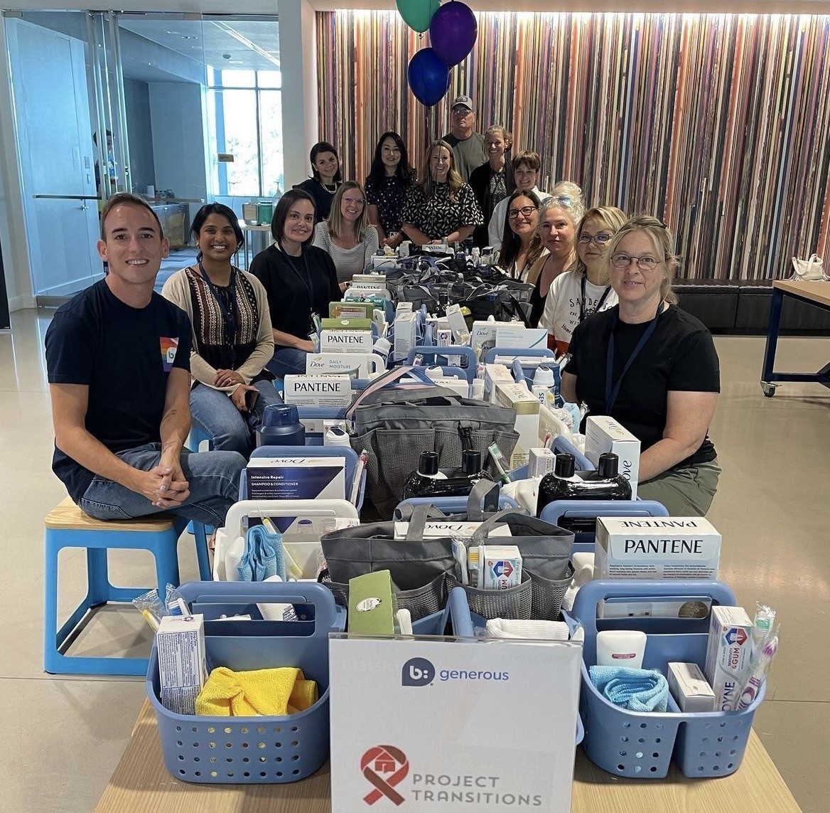 Some of our Austin employees making hygiene kits for Project Transitions.