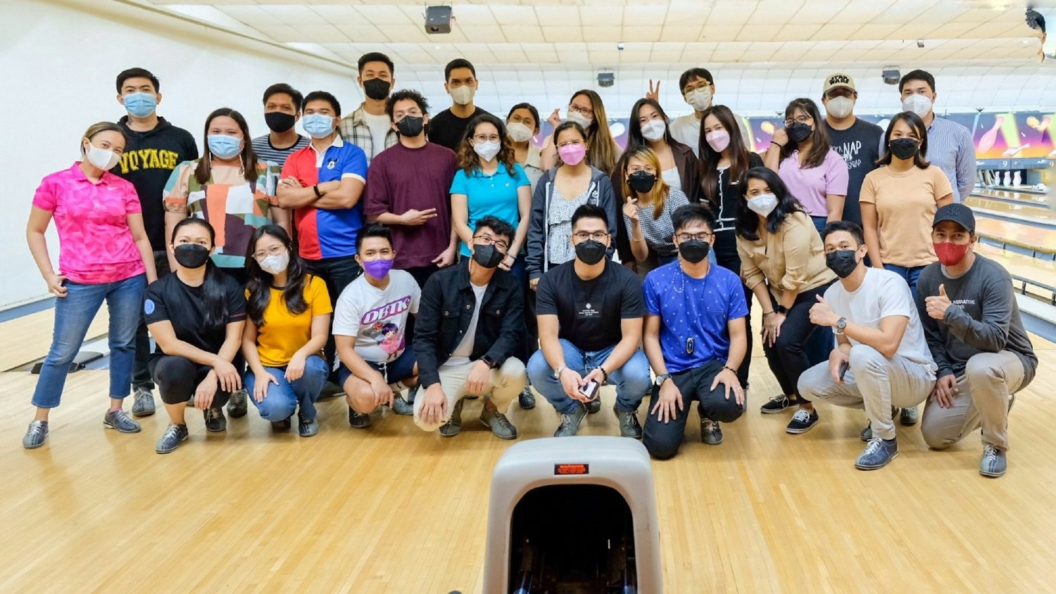 Manila Culture Club employees gathered for a night of bowling.