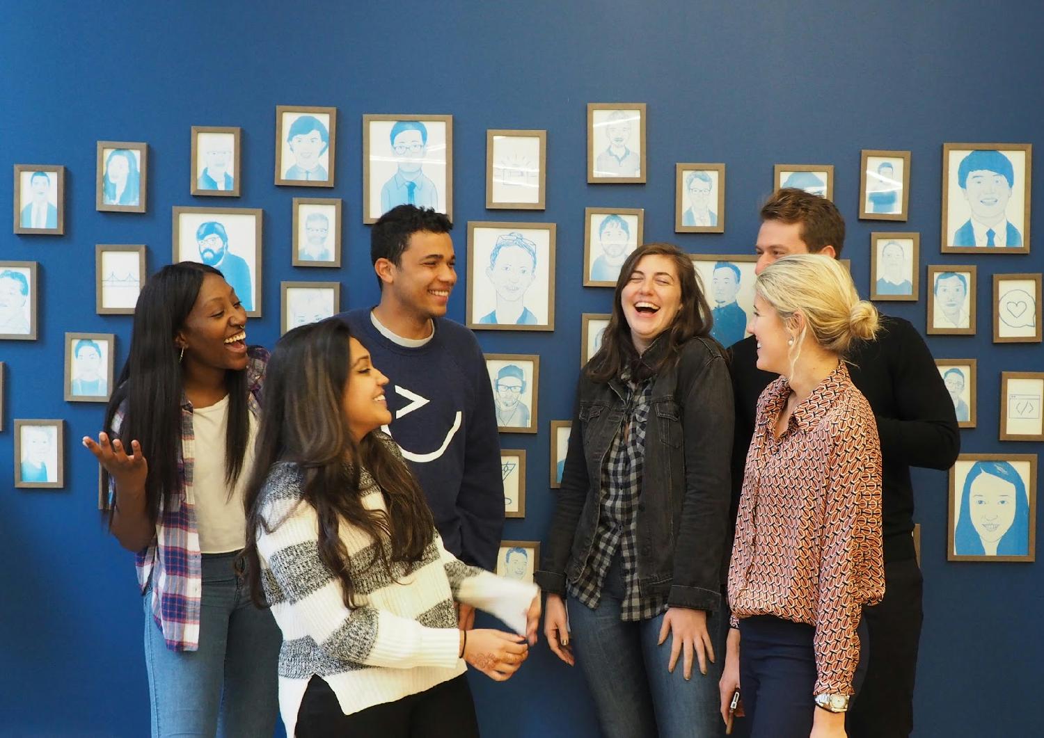 Our Candidate Experience Team sharing a joke and prepping for new head shots in our NYC headquarters.