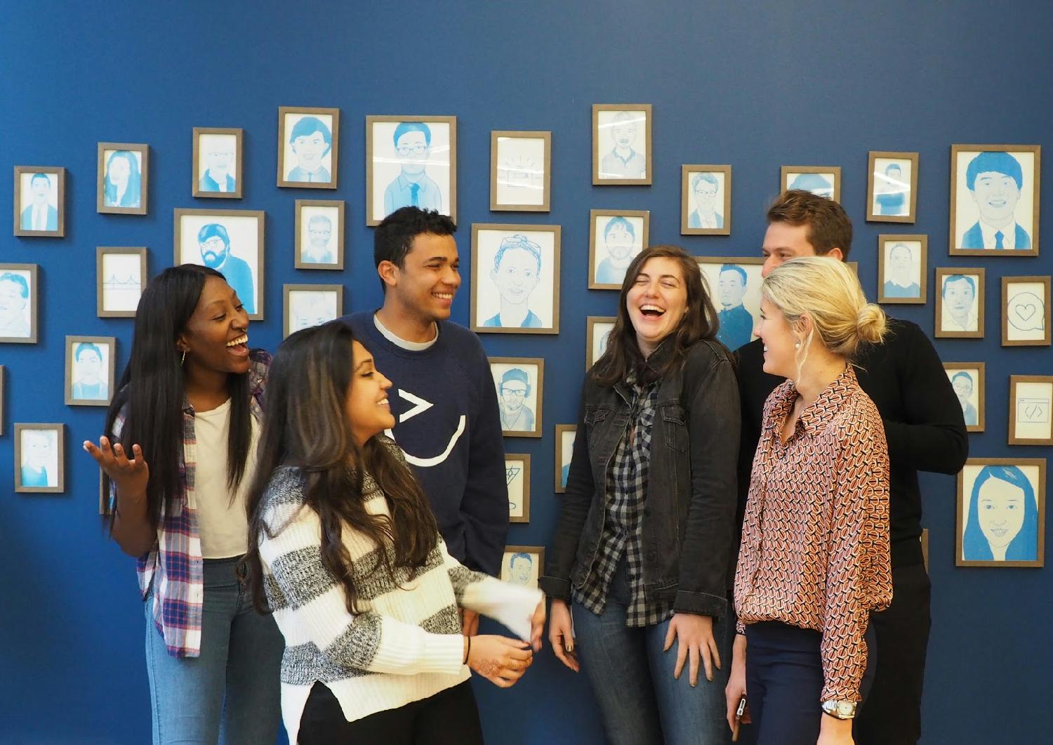 Our Candidate Experience Team sharing a joke and prepping for new head shots in our NYC headquarters.
