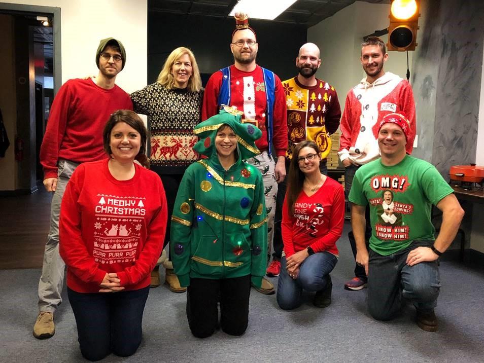 Ugly sweater contest during iHire's annual Holiday breakfast