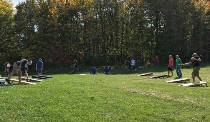 Cornhole competition at iHire's annual staff retreat.