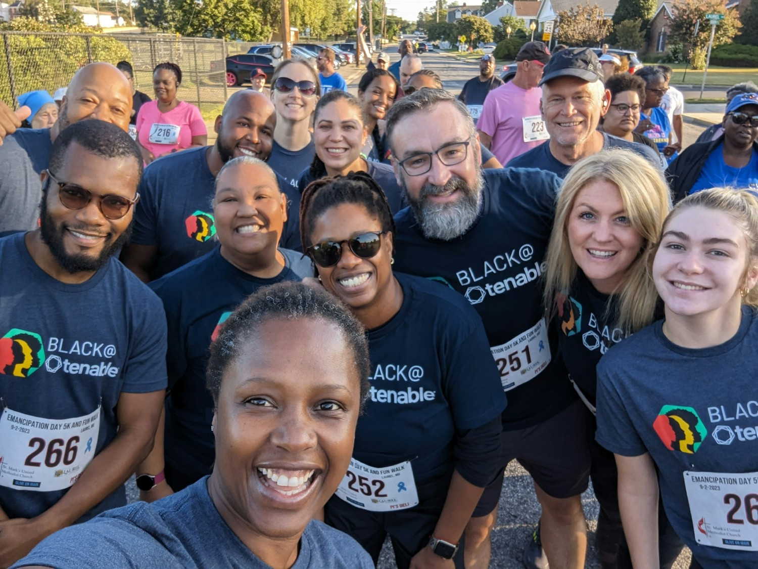 Some of our Black @ Tenable group participating in a 5K. 