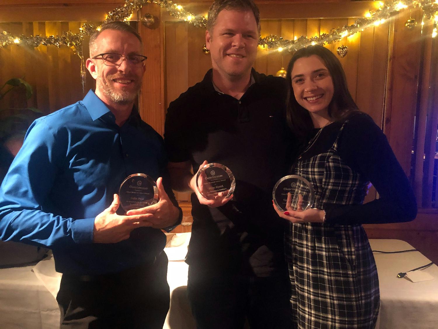 Q4 2019 Christmas celebration.  Awards ceremony.  Colin Pear, Mike Alpert & Haley Akchurin.