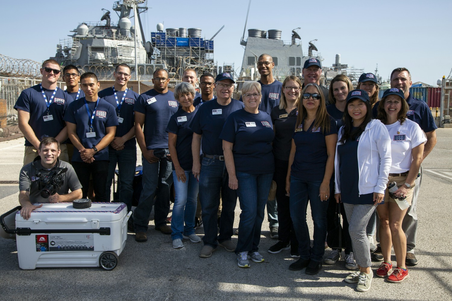 Bringing a special lunch to service members aboard a Naval ship. 