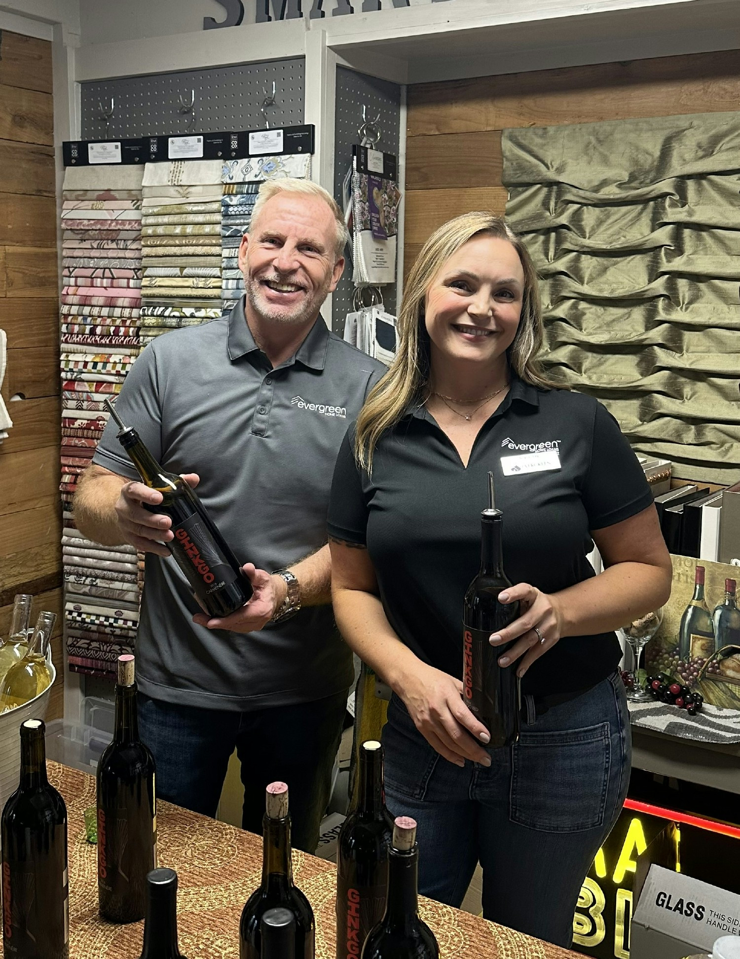 EVP Head of Production, Robert Lipston, and Branch Manager, Siera Jay, at an Enumclaw Chamber Wine Walk