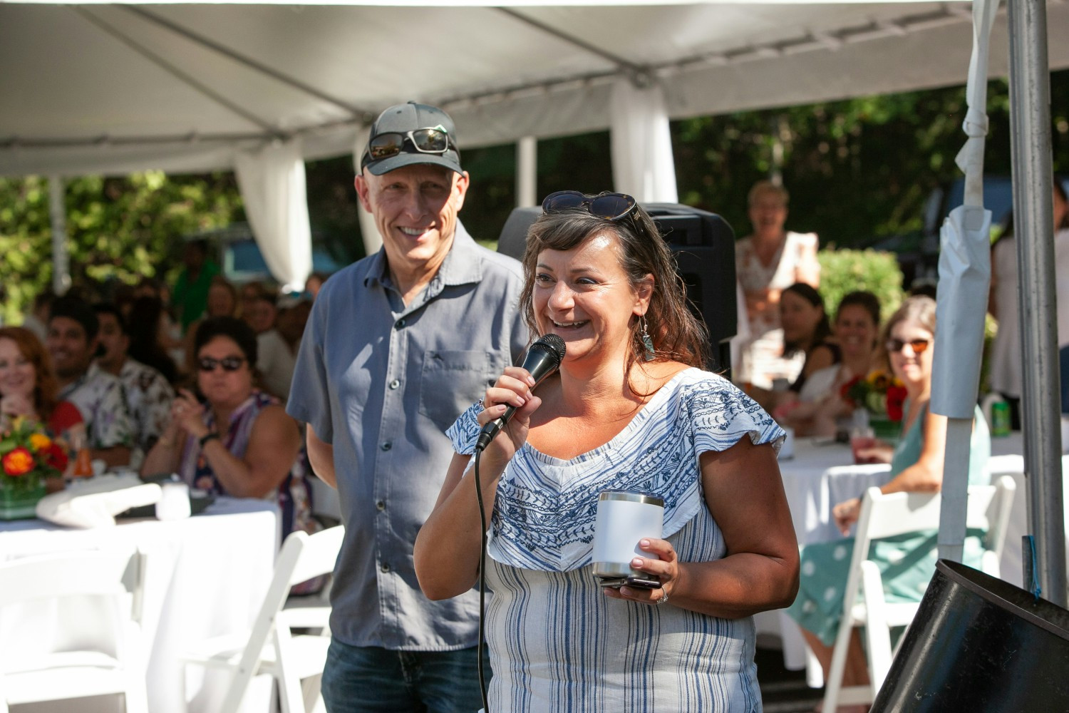 Tamra Rieger, President, (front) and our CEO, Don Burton (Back) at our Annual Summer Parking Lot Party