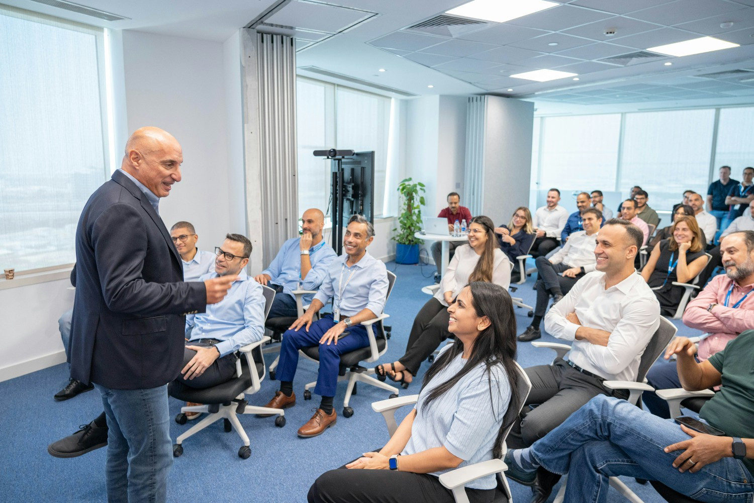 Focused minds, shared goals—team members gather for an engaging session, driving collaboration and innovation forward.