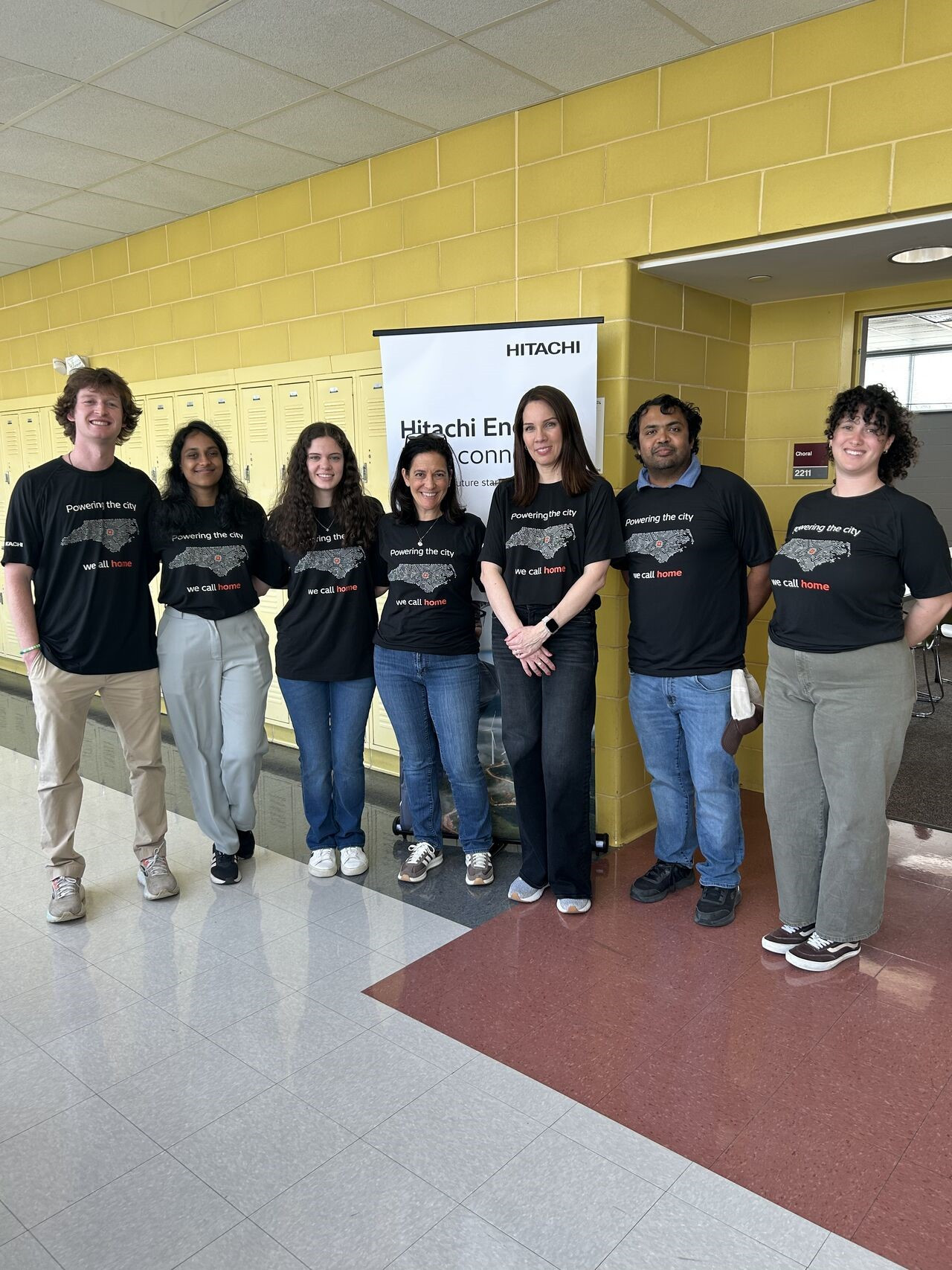 Employees volunteering with Wake County high school.  WCPSS Future Innovators Symposium with a focus on energy.