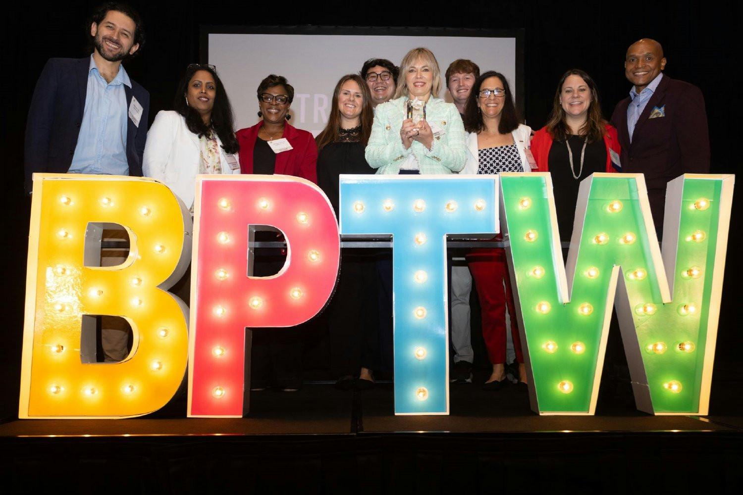 Employees and leaders celebrating our Triangle Best Place to Work recognition.