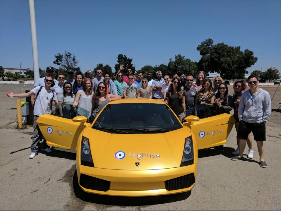Highfive snaps a photo after testing driving a Lamborghini for a company off-site
