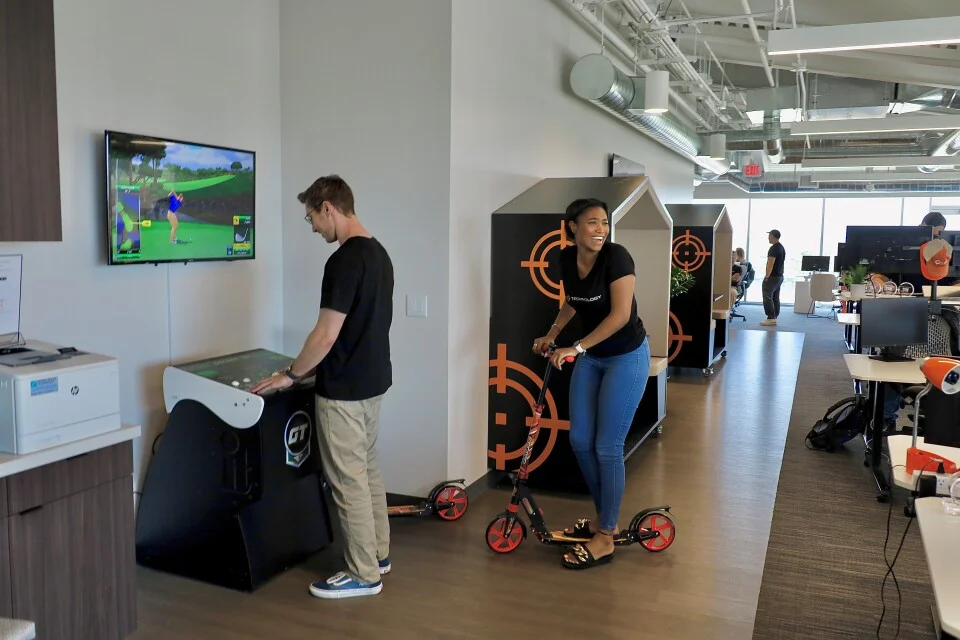 DAS Technology's office has a golfing game and a scooter to get around and have some fun. 