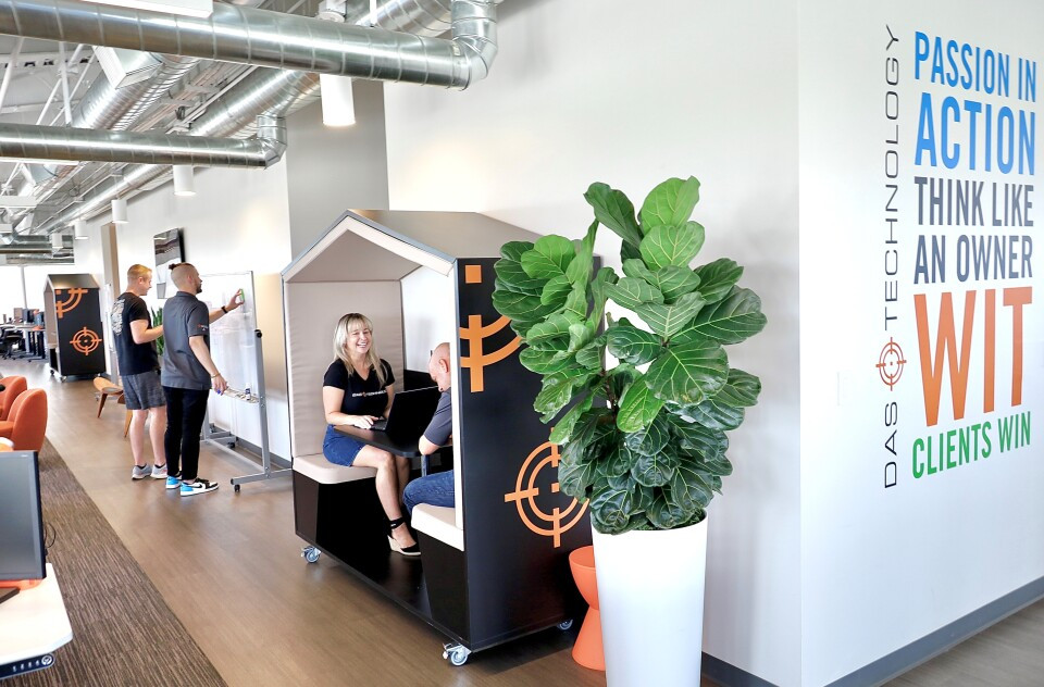 Nooks for one-on-one talks and company values line DAS Technology's Scottsdale penthouse office walls. 