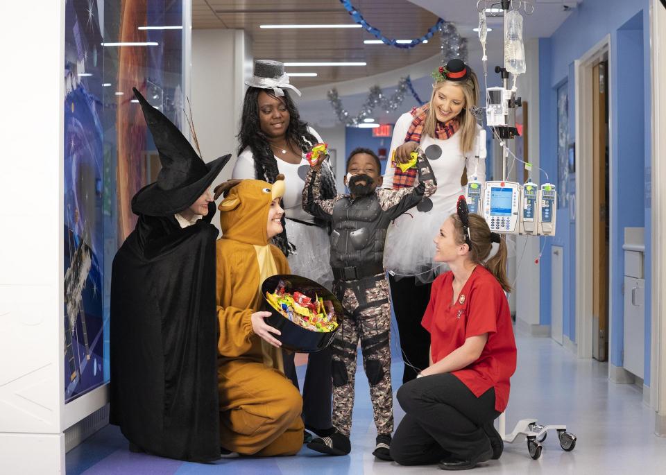 On Halloween, St. Jude patients can forget about the radiation, the chemo, the surgeries—and just be kids—thanks to the hundreds of employees who go all out to dress up, decorate and dole out tons of candy.