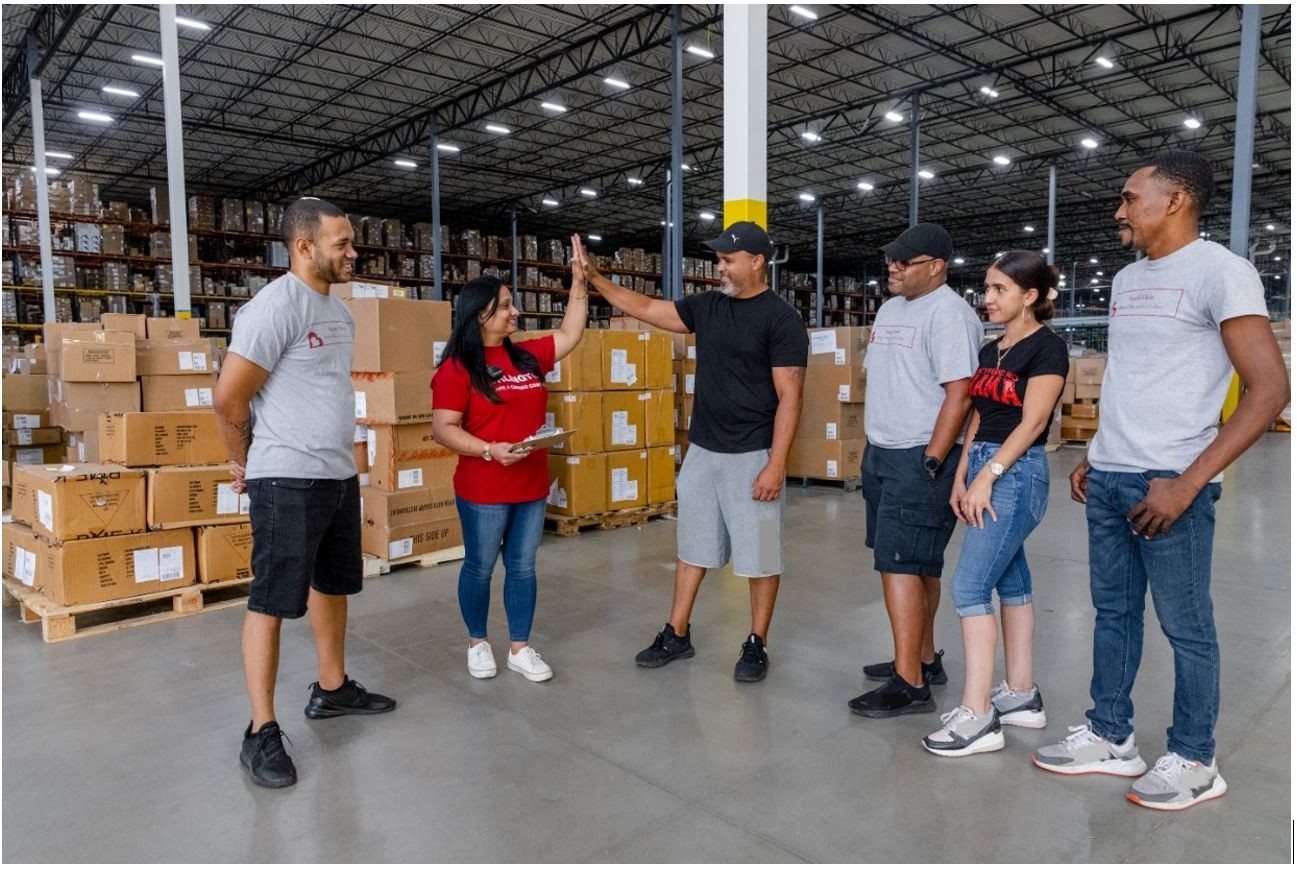 High five to a job well done by our Distribution Center team!