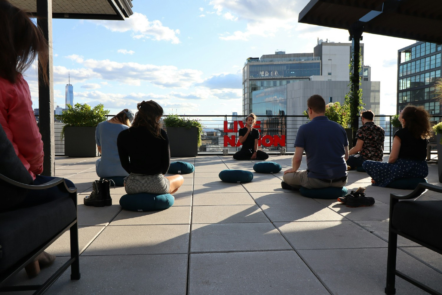 Live Nation employees take a mental health pause with a meditation hosted by Mindful Nation.