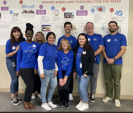 Employees packed enough Toddler food bags at Infant Crisis Services to feed 208 toddlers for one week. 