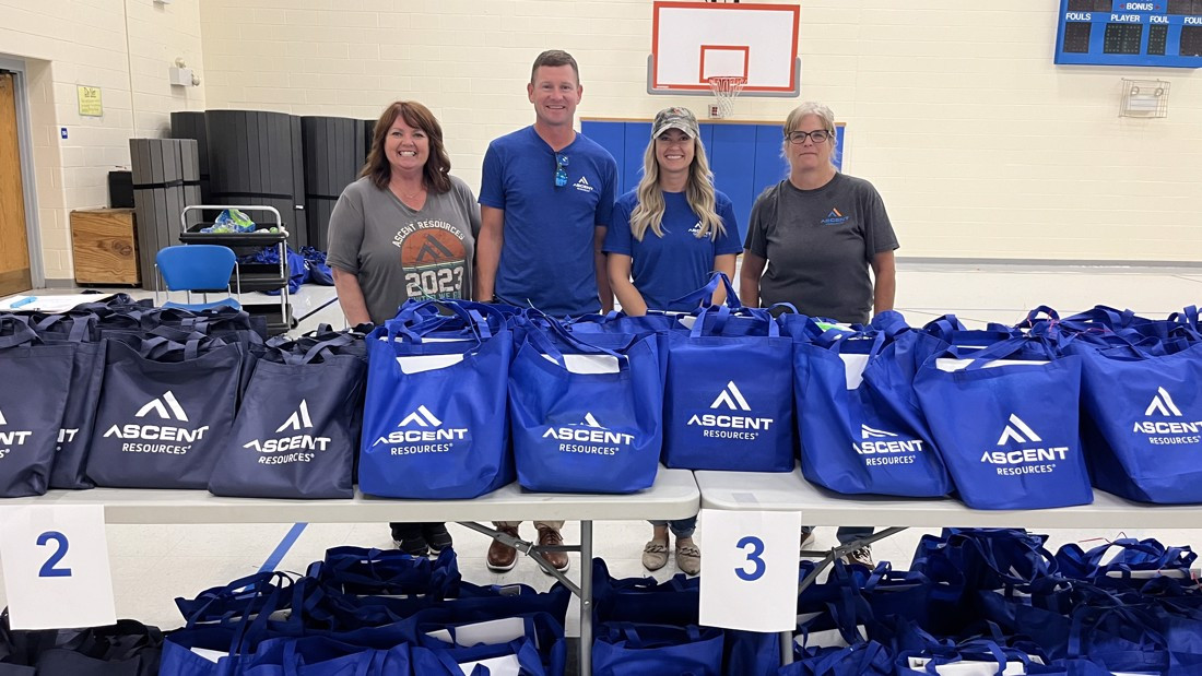 Employees stuffed 450 bags with school supplies for the Annual Pack the Backpack campaign supporting a local school.
