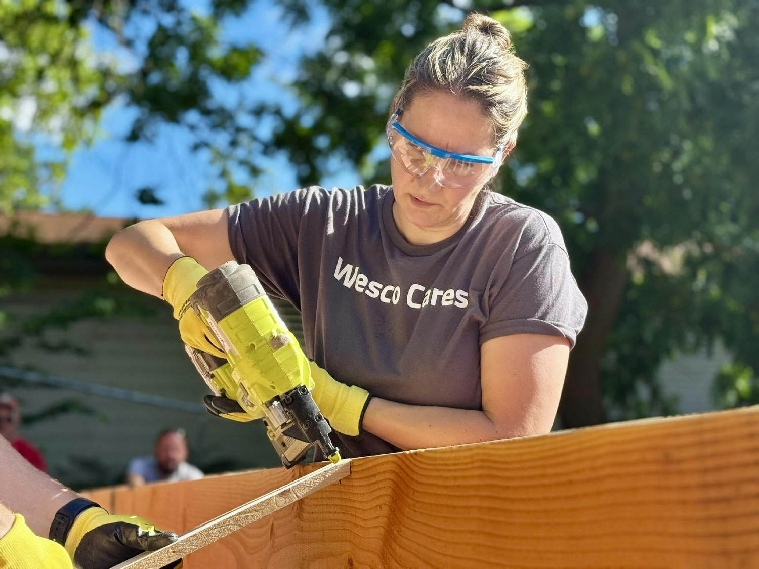 Wesco employee participating in a Habitat for Humanity build.