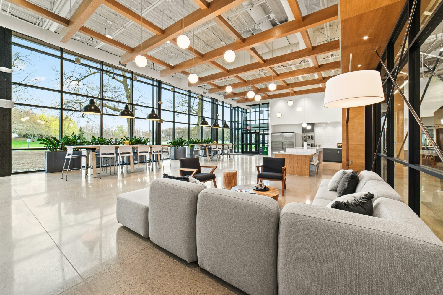 Modern and spacious office space at WWW's global headquarters in Rockford, MI, featuring open seating and natural light.