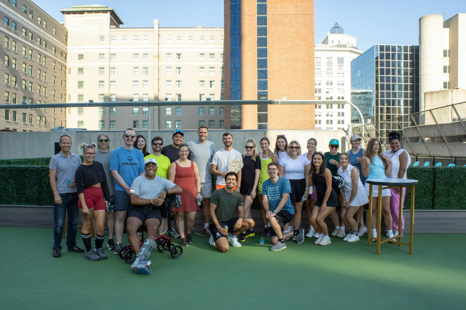 WWW's Working Young Professionals Employee Resource Group hosts an engaging rooftop pickleball tournament after hours.