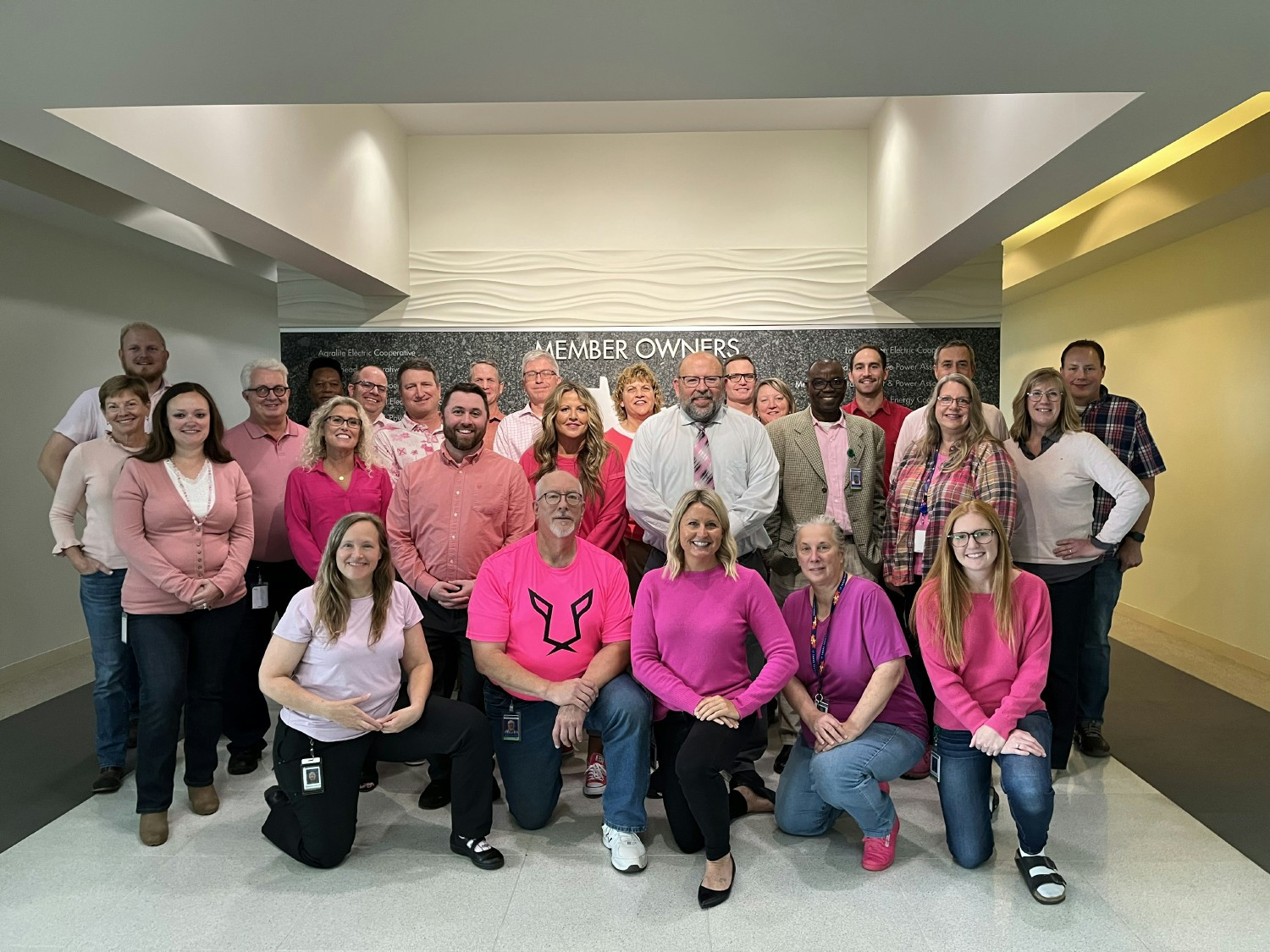 Employees wore pink to raise awareness and show their support of those impacted by breast cancer.
