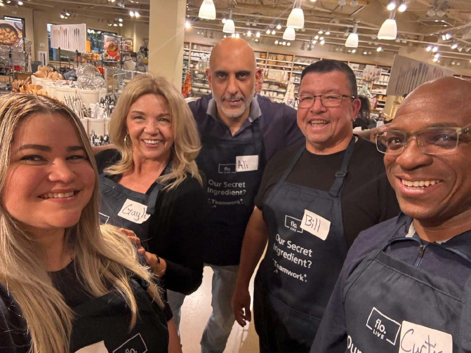 Team activity -cooking together with a private Chef! Aprons say it all