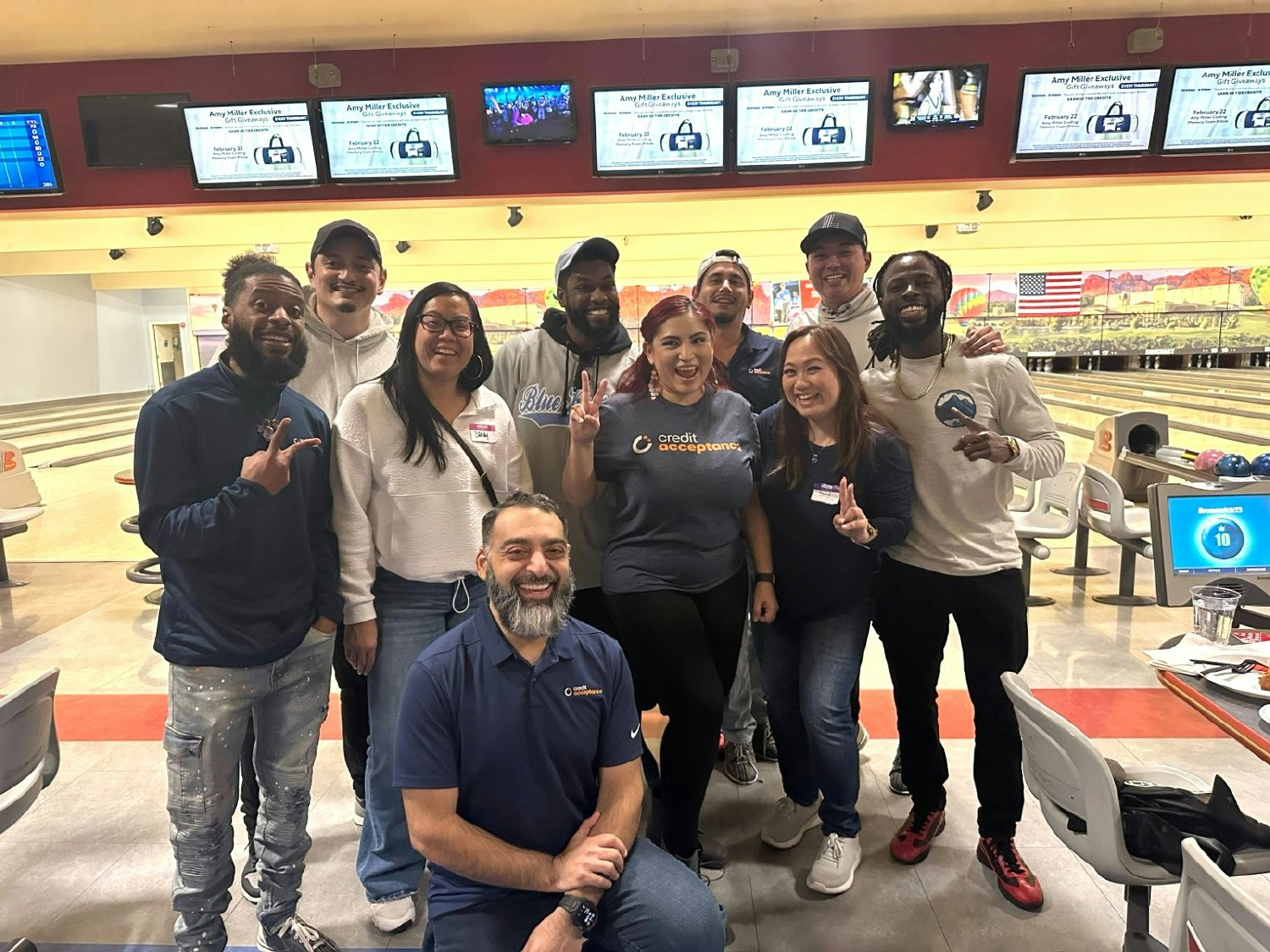 Collaborating and connecting while tying fleece blankets for local children during our Thankful Harvest event.