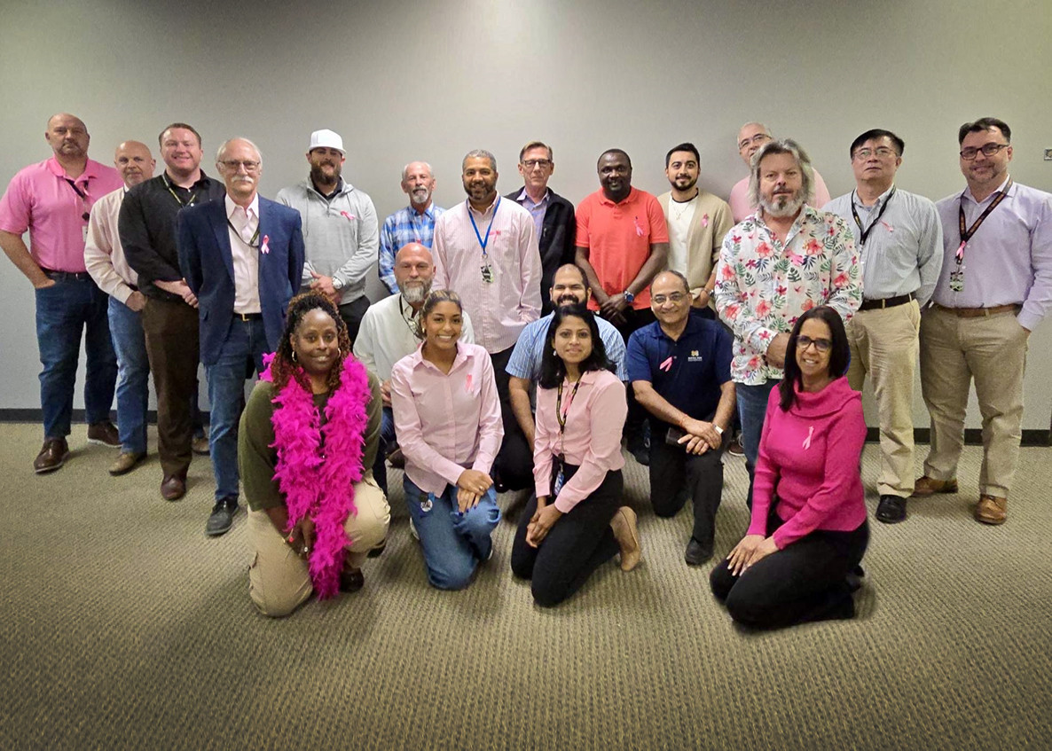 Employees supporting Breast Cancer Awareness Month