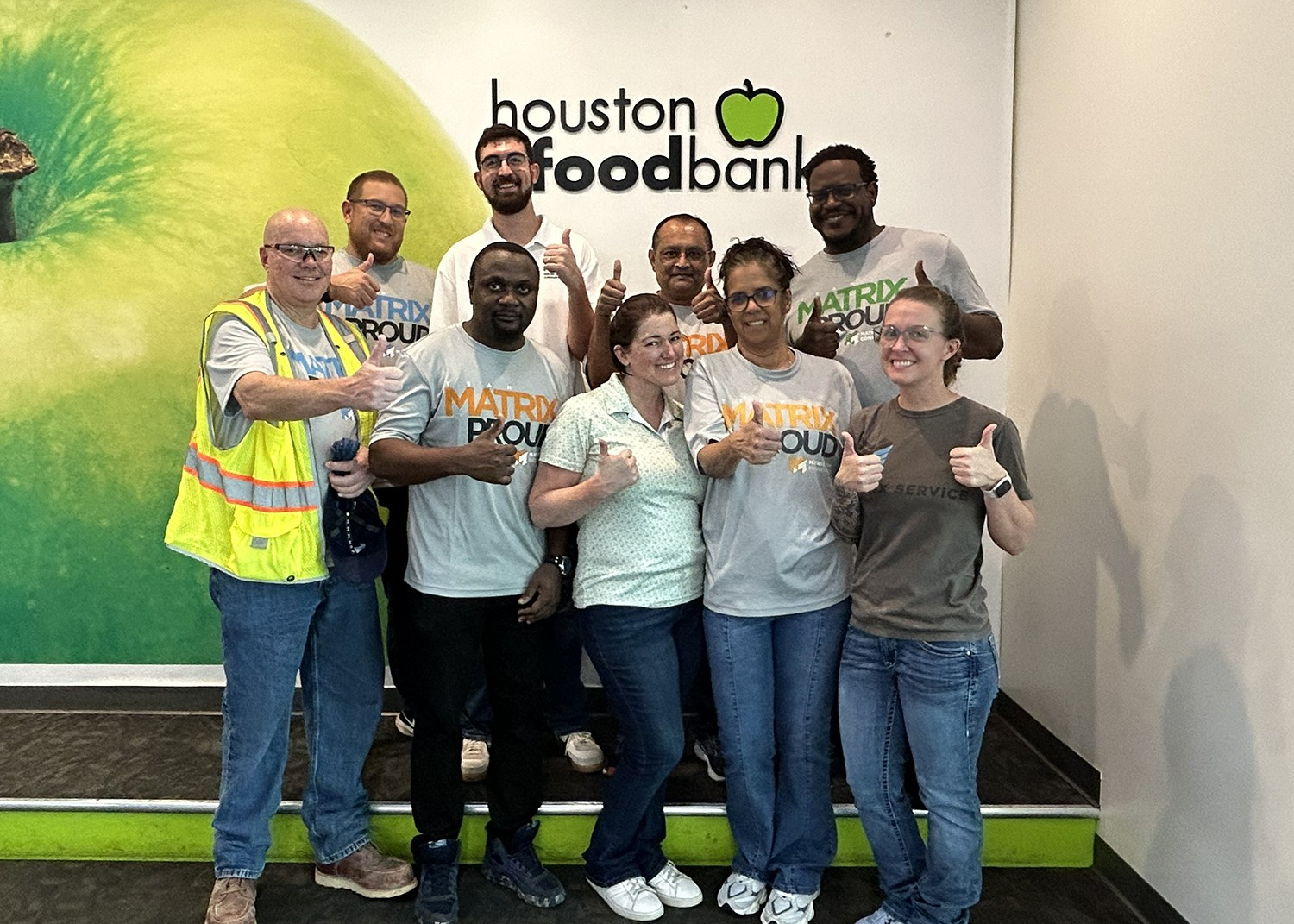 Houston employees showing giving their time and treasure to the Houston Food Bank