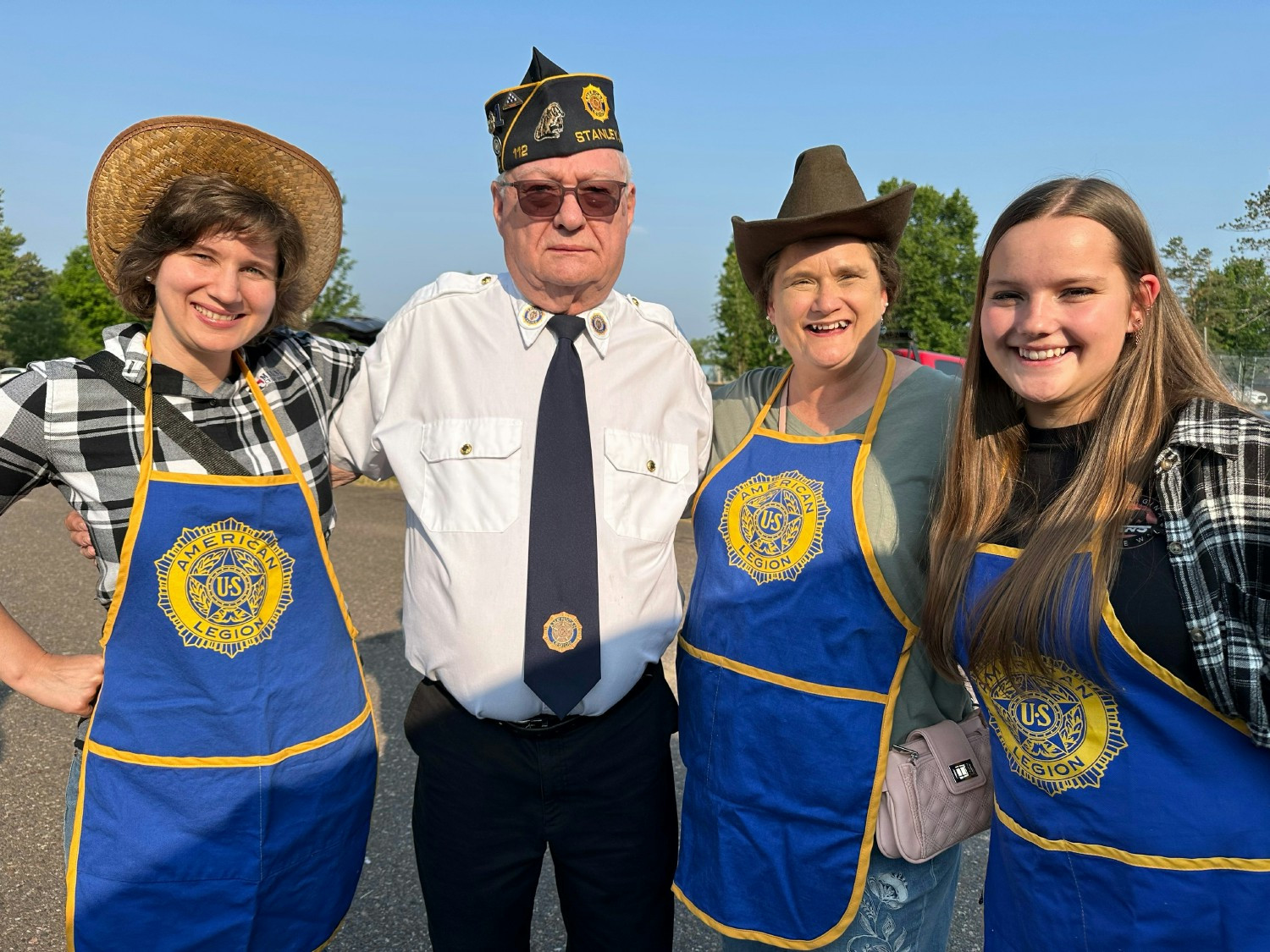 MCU employees selling raffle tickets to benefit the Lions club at the rodeo in Chippewa Falls.