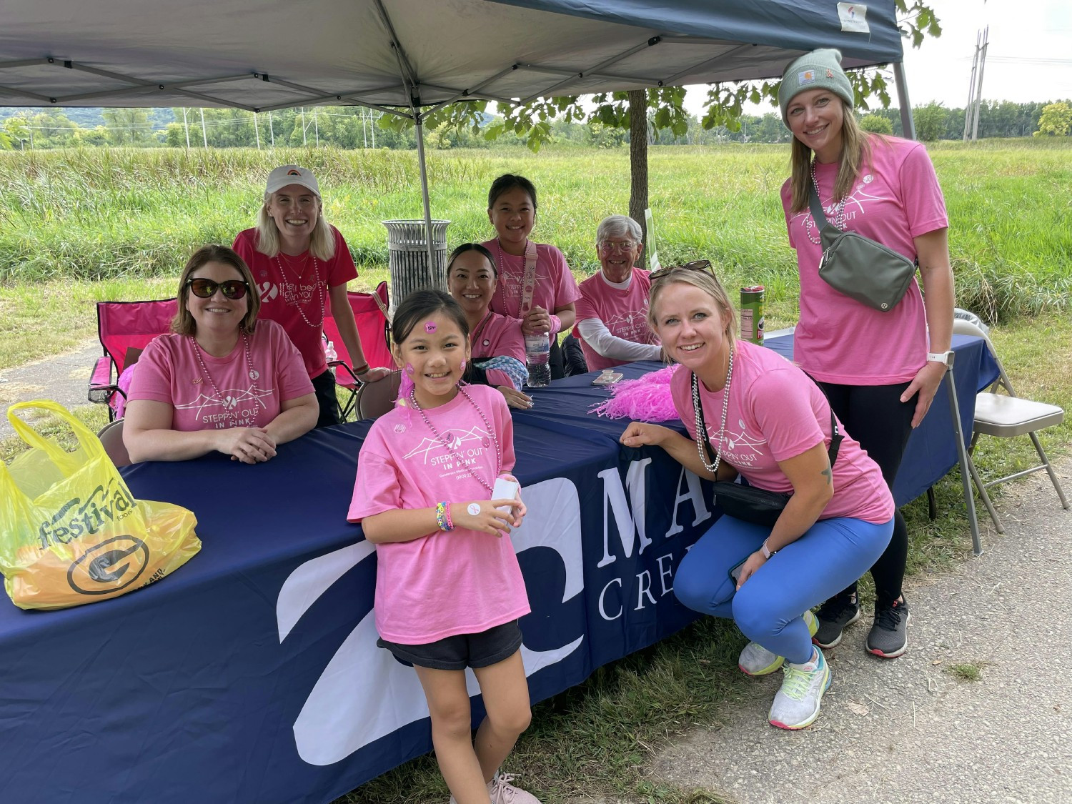 Marine Credit Unions booth at Steppin' out in Pink