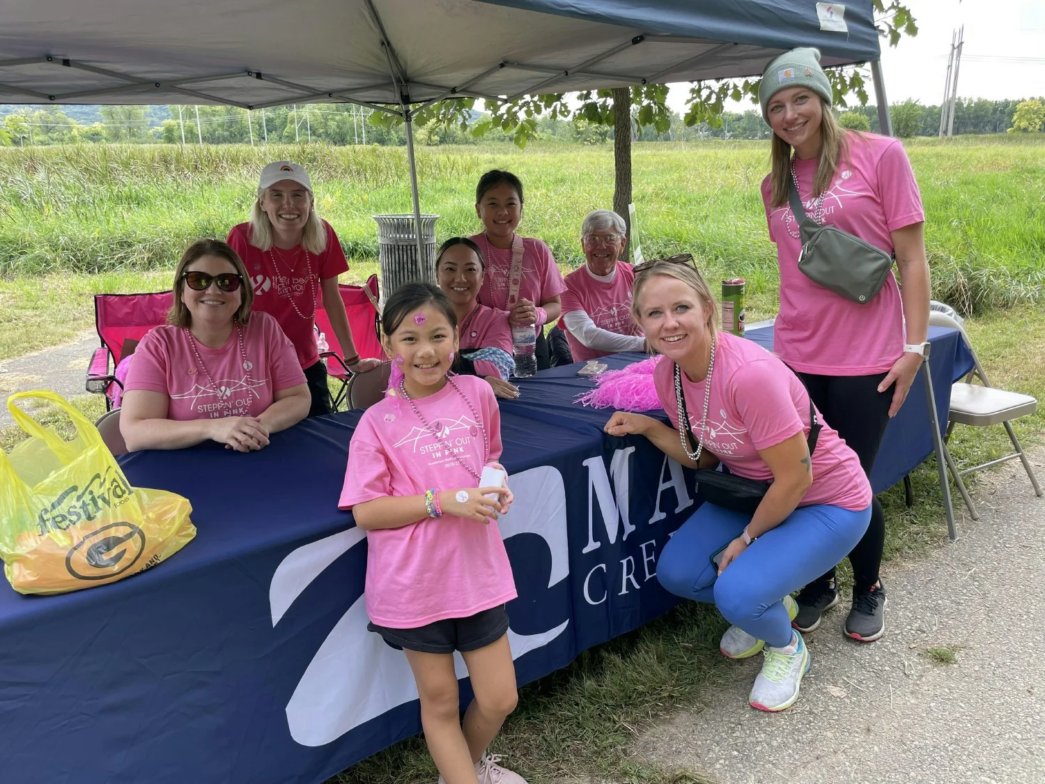 Marine Credit Unions booth at Steppin' out in Pink