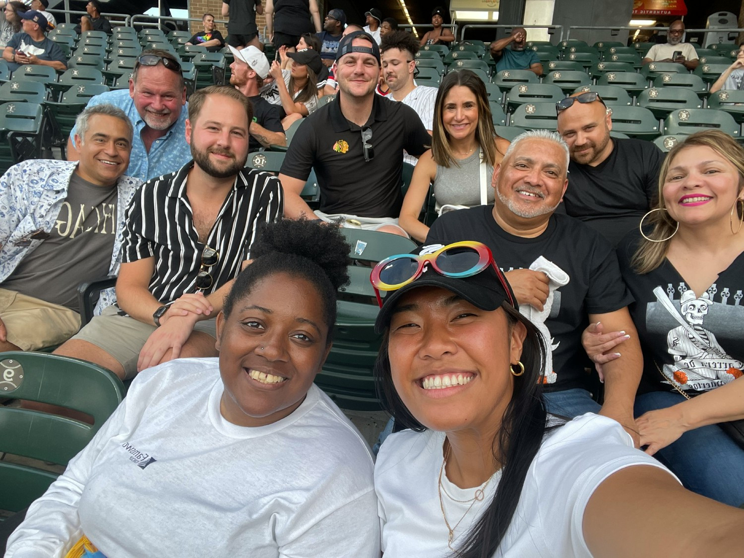 COLLEAGUES TOOK A REFRESHING BREAK AND ENJOYED A BASEBALL GAME.