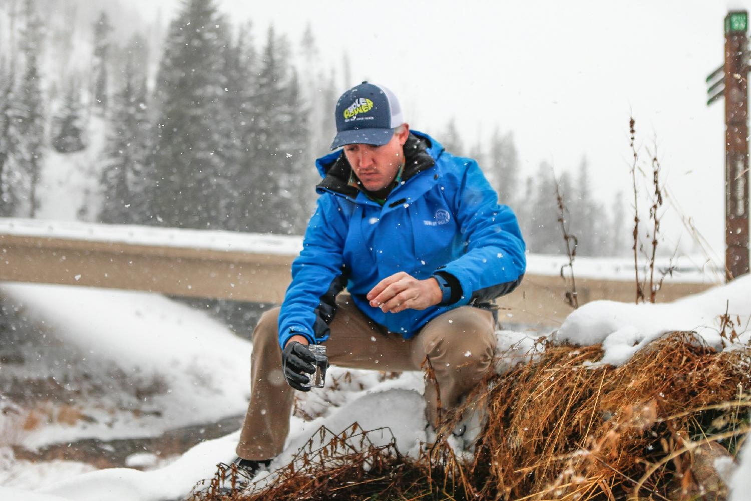 Our watershed education coordinator hard at work taking river samples. 