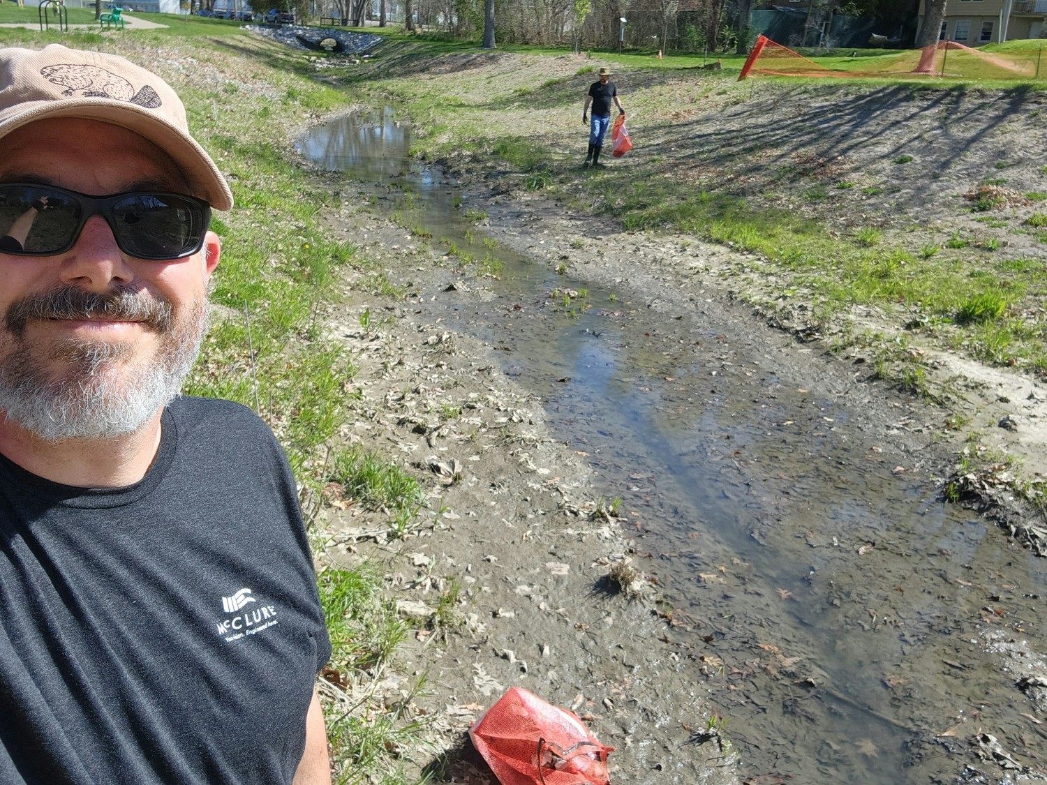 McClure team members volunteer to clean up city parks and streams, plant trees, and prepare for the season.