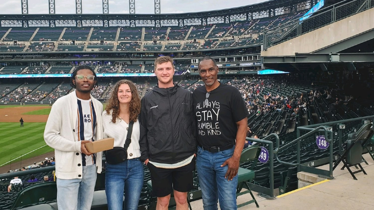Play ball! Denver employees invite the new intern to a local game. 