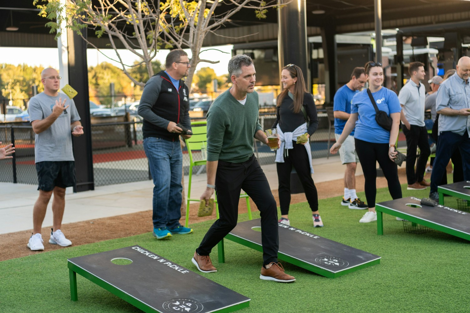 Brain Hayduk, CEO playing cornhole @ Chicken & Pickle 