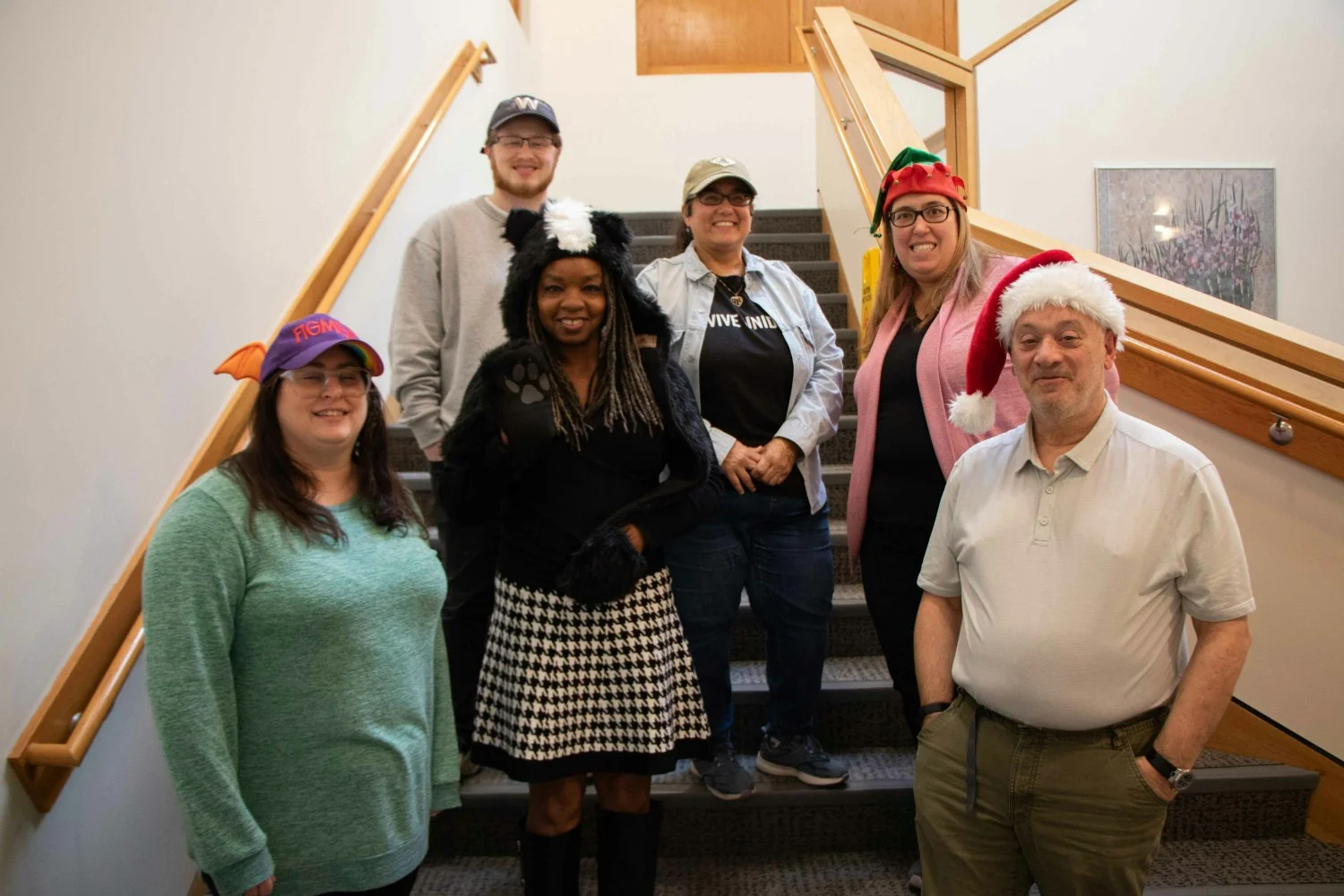 Employees have fun with Crazy Hat Day as part of AIPSO's yearly United Way Campaign