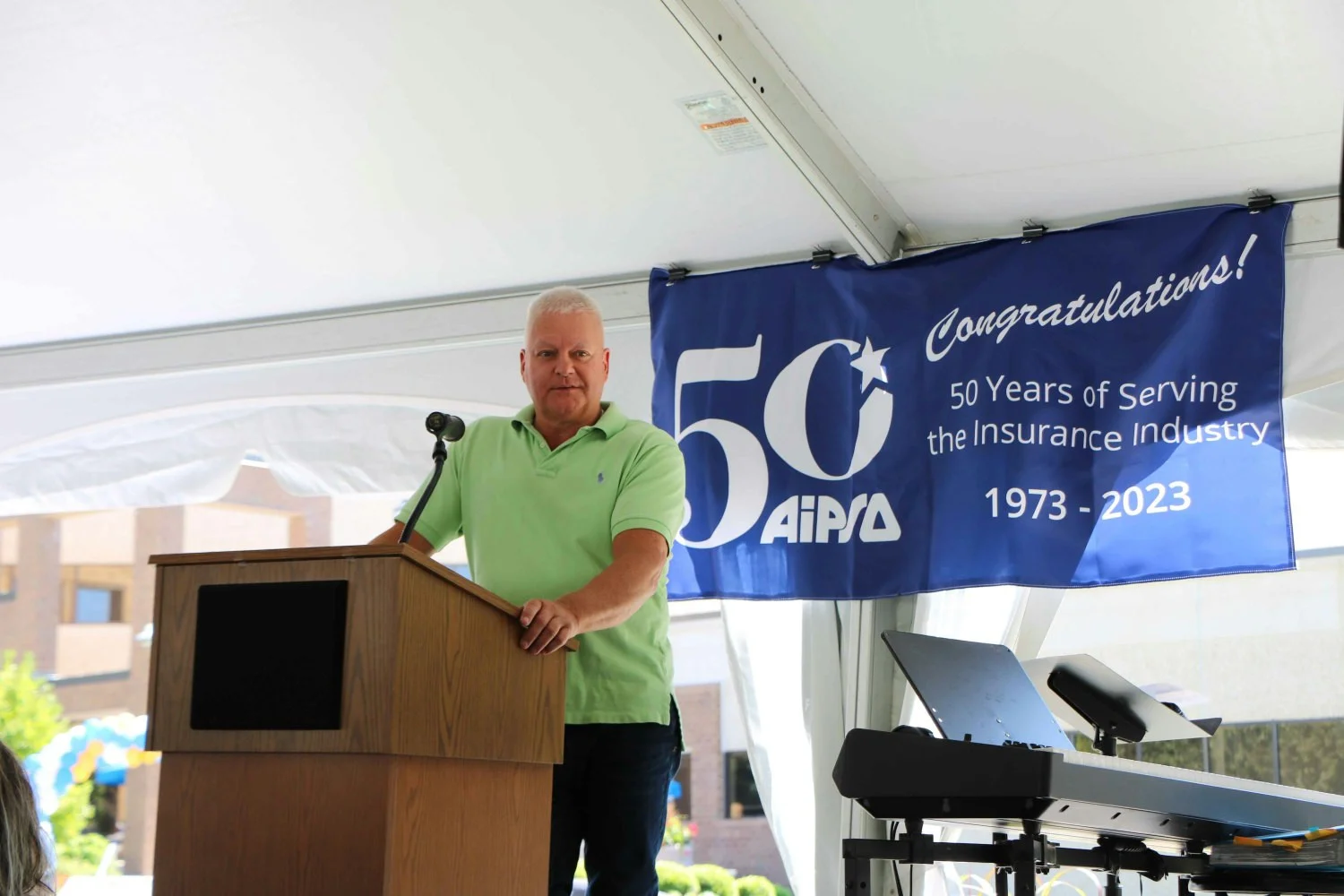President Chuck Kwolek speaks at AIPSO's 50th anniversary celebration