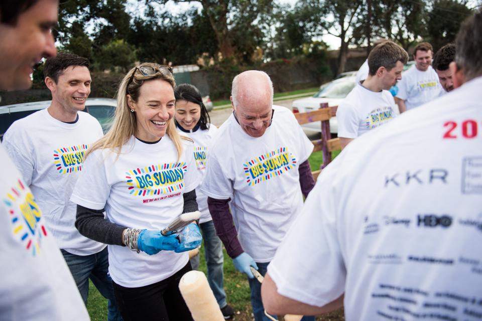 KKR Employees, including Co-Founder and Co-CEO Henry Kravis, complete a community service project. 