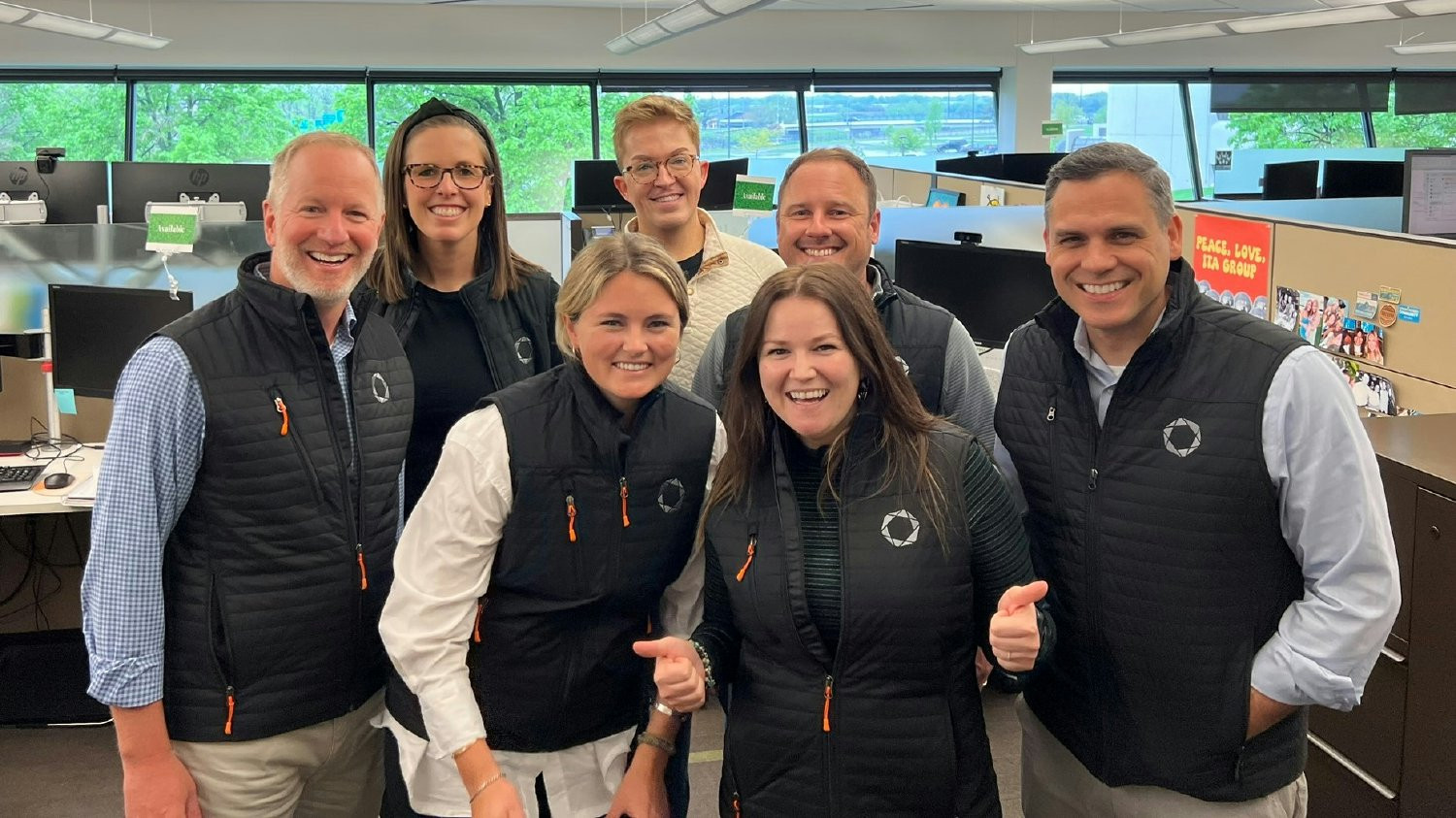 Team members celebrating milestones in the journey to employee ownership.