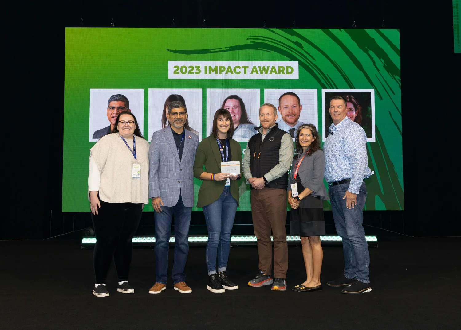 Team members being awarded for making an impact in our communities.