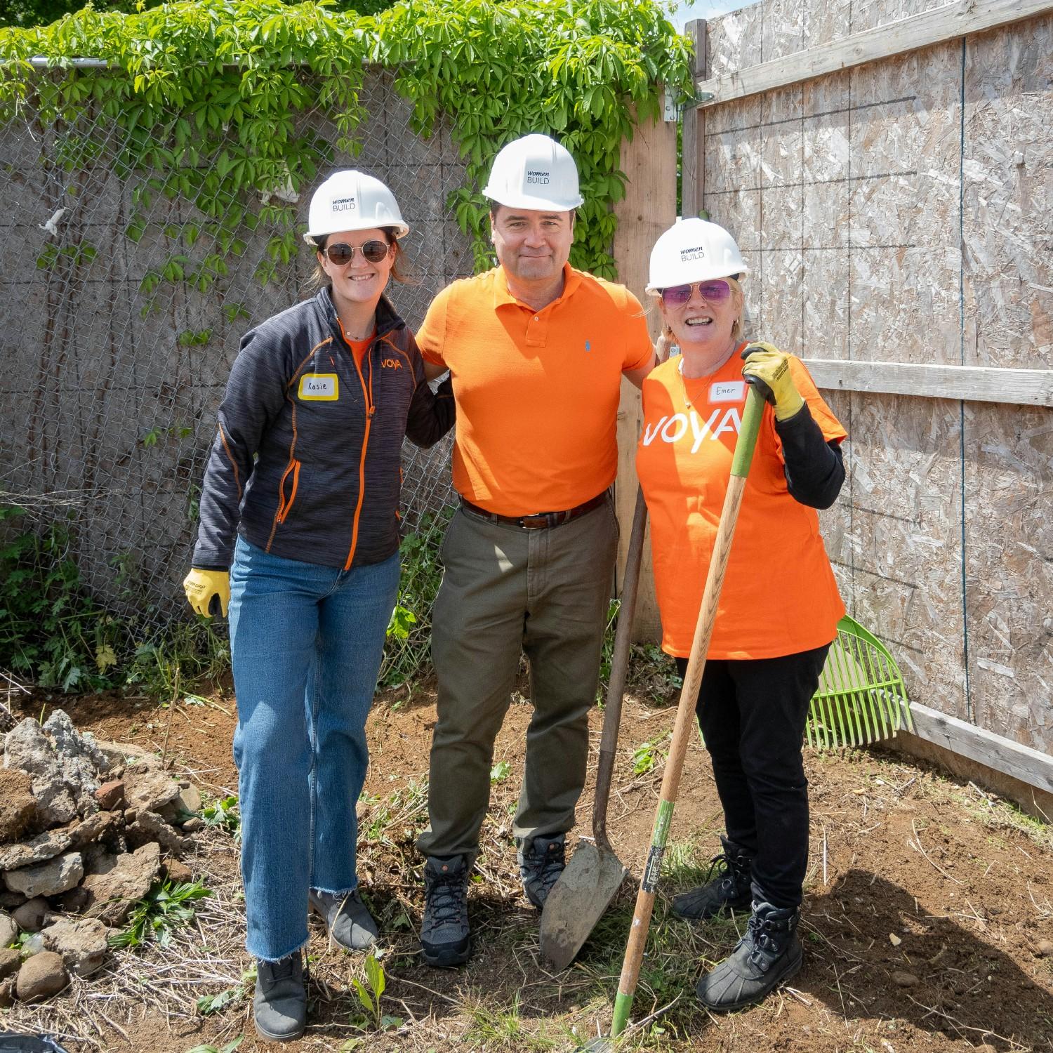 Employees helping build a house as part of our National Days of Service.