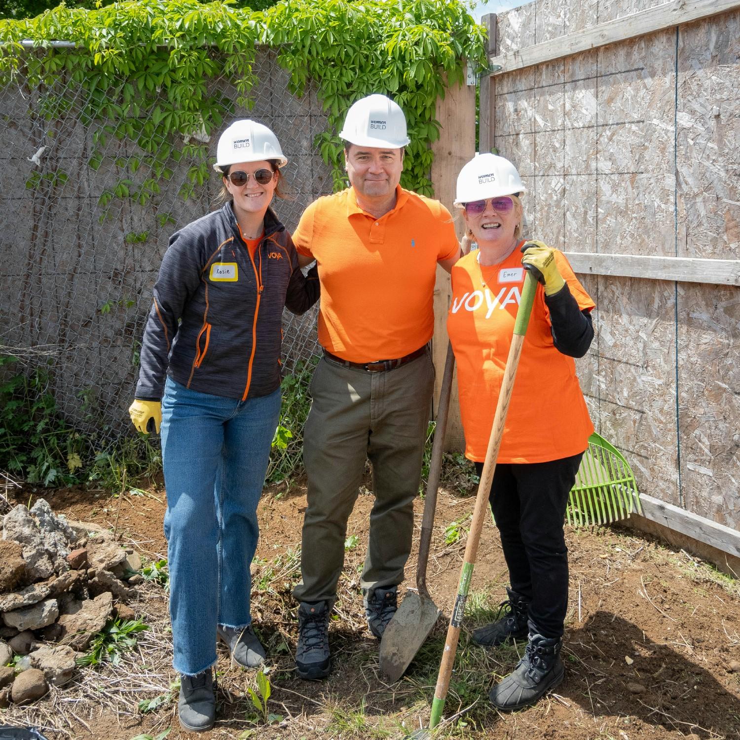 Employees volunteering with Elizabeth Park Maintenance in Connecticut.