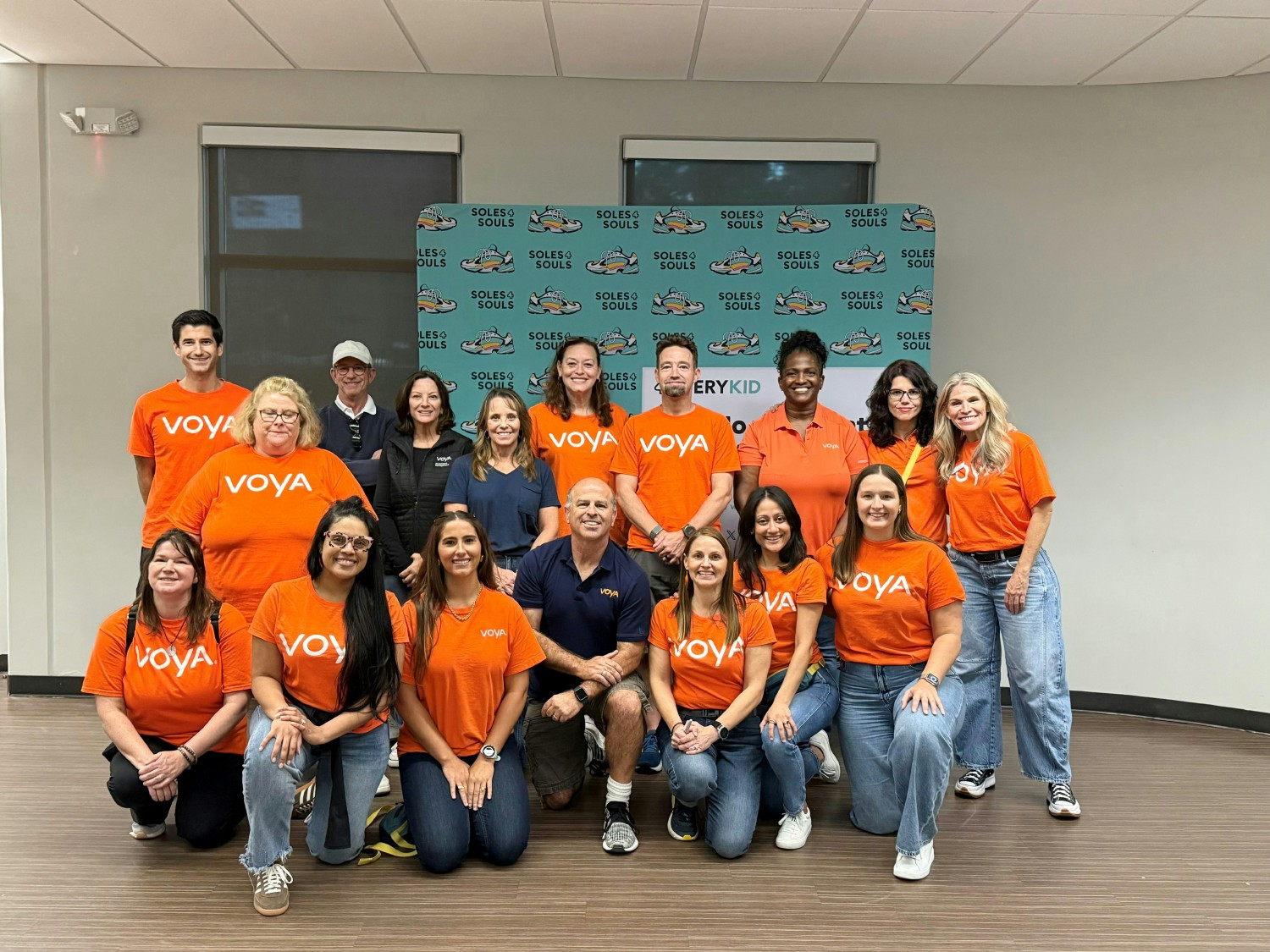 Voya employees work with Soles for Souls to provide proper shoes and clothing to those who need it most in San Diego.