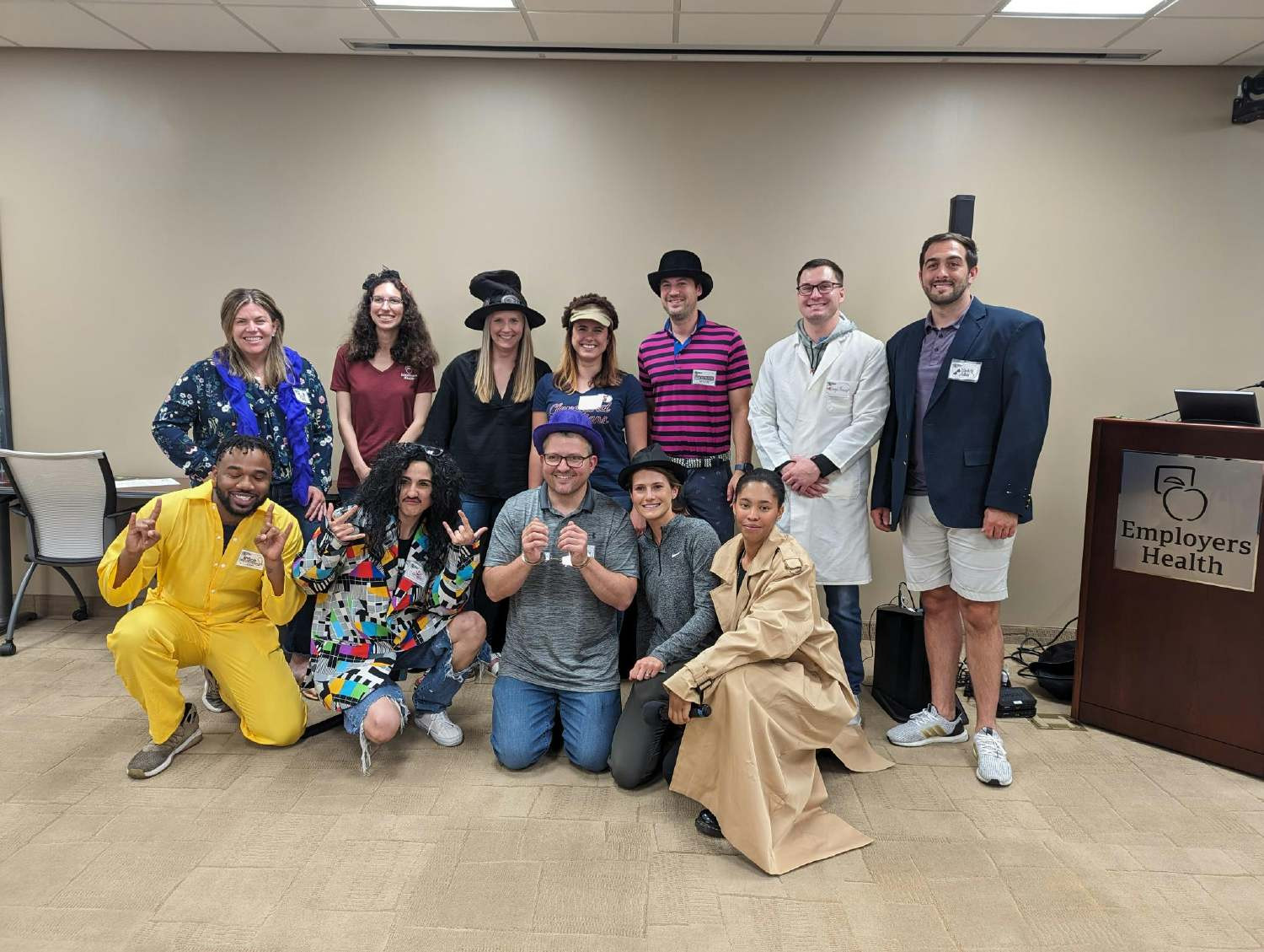 Staff participating in a murder mystery activity.